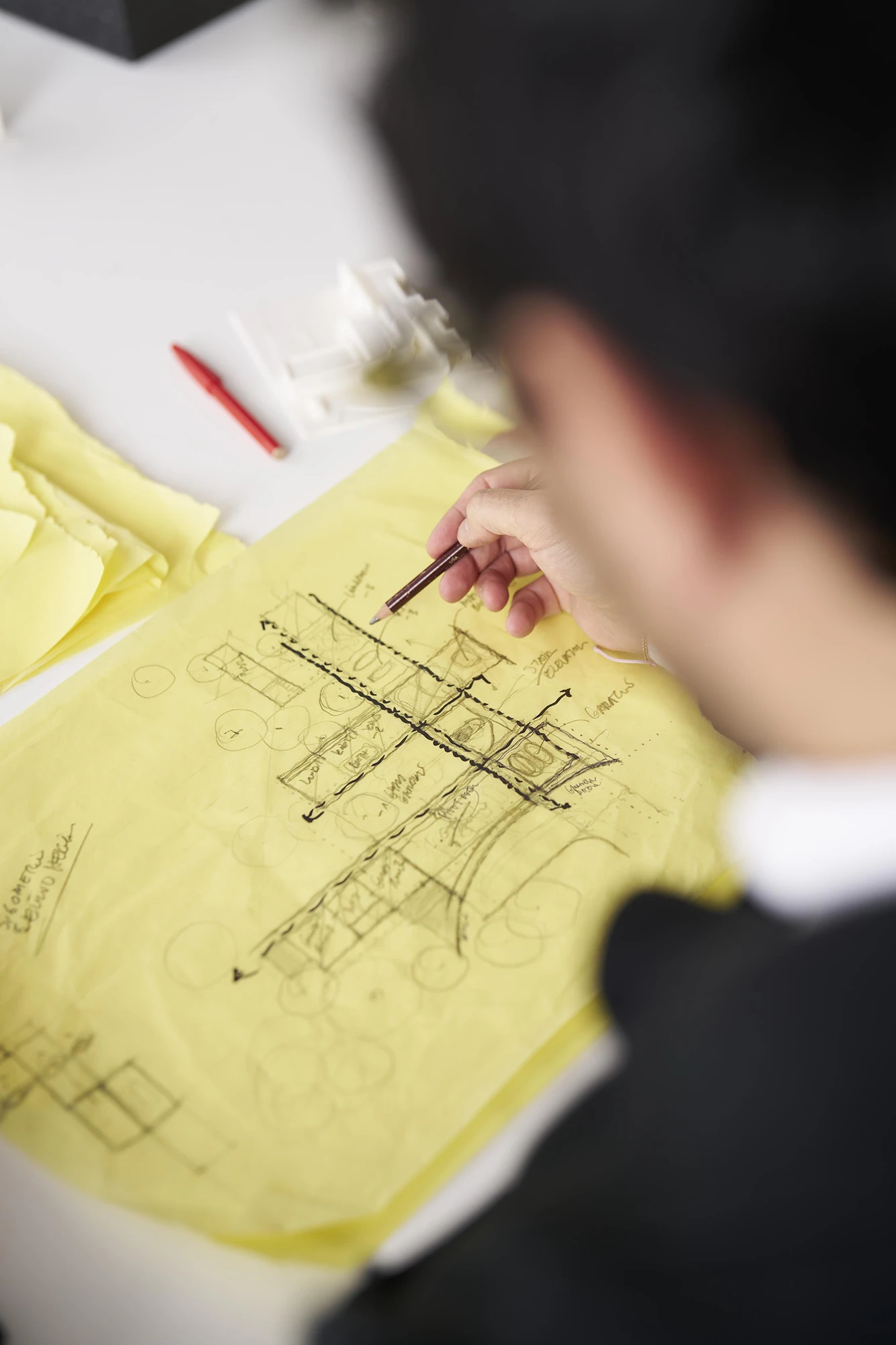 Architect sketching architectural concepts during design development